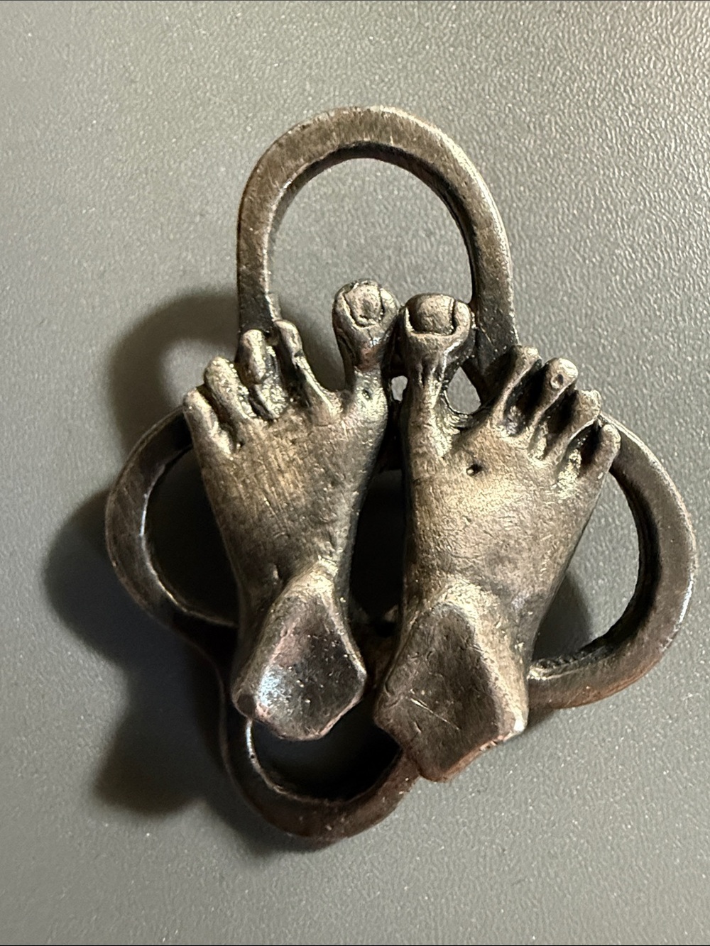 Like feet?  Unique? vintage metal (pewter?) feet brooch